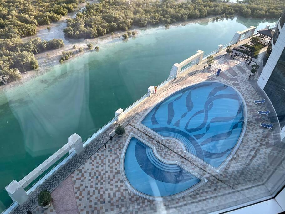 Cozy Upgraded Residential Flat With Sea, Mangrove, Pool View - 1203 Not Hotel アブダビ エクステリア 写真